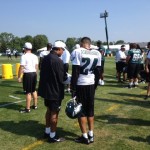 Philadelphia Eagles defensive coordinator Juan Castillo talks to cornerback Nnamdi Asomugha.