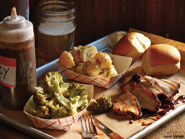 fette-sau-stephen-starr-bbq-food-brisket-duroc-pork-belly Stephen Starr's Fette Sau serves up some BBQ brisket and pork belly with classic southern sides.