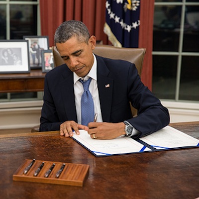 The president signed a bill ensuring the military will be paid during the shutdown.