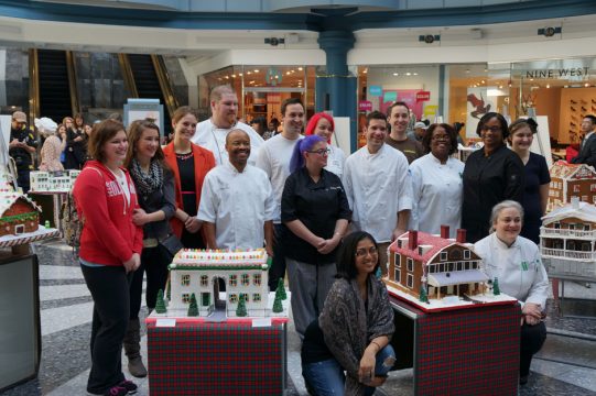All the pastry chefs pose for a photo.