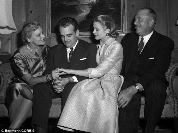 Grace sitting with Rainier of Monaco and her parents at the Kelly's Henry Avenue residence