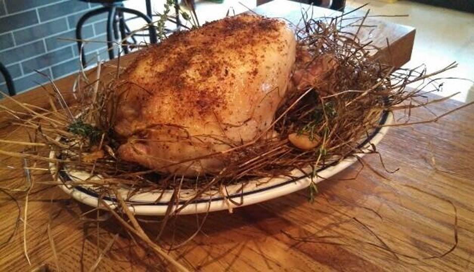 Chicken baked in hay.