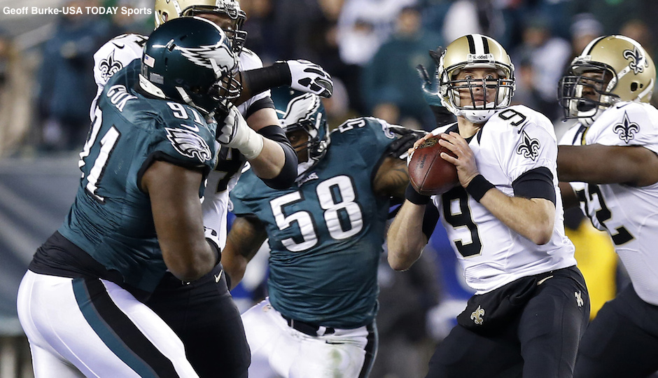Jan 4, 2014; Philadelphia, PA, USA; New Orleans Saints quarterback Drew Brees (9) prepares to throw the ball as Philadelphia Eagles outside linebacker Trent Cole (58) and Eagles defensive end Fletcher Cox (91) chase in the first quarter during the 2013 NFC wild card playoff football game at Lincoln Financial Field. Photo |  Geoff Burke-USA TODAY Sports