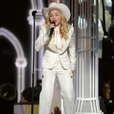 Madonna sang along as Queen Latifah married 33 couples during last night's Grammy Awards. Photo courtesy of Kvork Djansezian/Getty Images.