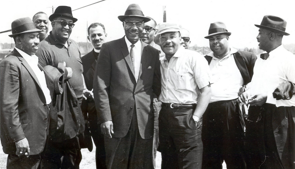 This photo — trom the Jack T. Franklin Photography Collection of the African American Museum in Philadelphia — shows Rev. King posing with the Philadelphia delegation of the Montgomery Civil Rights March in 1965.