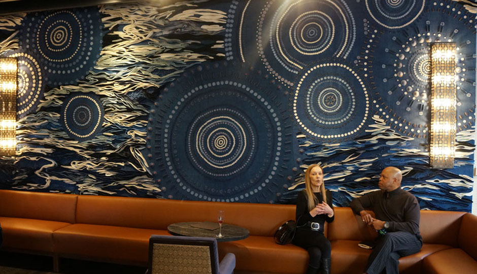 Designed by Philadelphian Conrad Booker, the textile mural is inspired by Volver's logo.