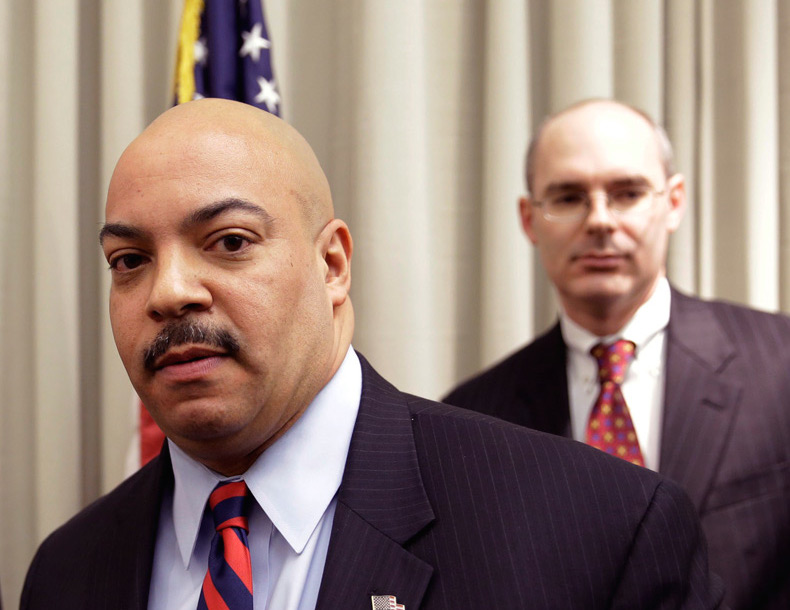 • Frank Fina, (pictured right, behind Seth Williams) who investigated the case and then moved to the D.A.’s office, used op-ed space to challenge Kane to be more forthcoming on her decision. Why didn’t he use his op-ed space — or any public forum — to make the argument for what charges should’ve been brought, and why?