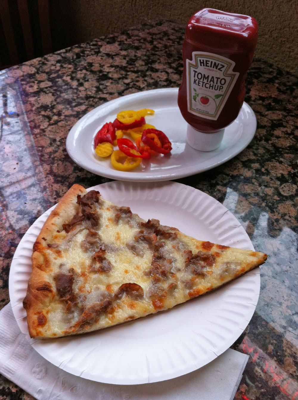 Sliced cherry peppers punched up the pizza with a puckery heat.