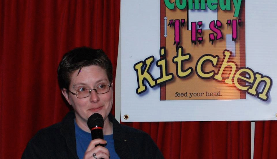 Stitzer performing at Comedy Test Kitchen in Philadelphia.