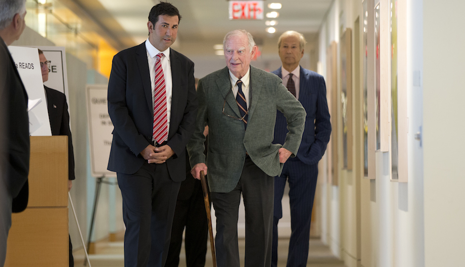 Drew Katz, left, son of Lewis Katz, right, walk with philanthropist H.G. "Gerry" Lenfest to a news conference after a closed-door auction to buy the The Philadelphia Inquirer and Philadelphia Daily News Tuesday, May 27, 2014, in Philadelphia. Lenfest and businessman Lewis Katz are taking over Philadelphia's two largest newspapers with an $88 million auction bid. (AP Photo/Matt Rourke)