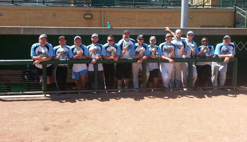 The Philadelphia Fusion model their gold from the dugout.