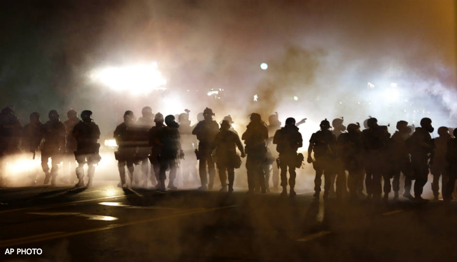There were demonstrations and tear gas in Ferguson after the summertime shooting of Michael Brown by a police officer. A grand jury will announce that officer's fate today.