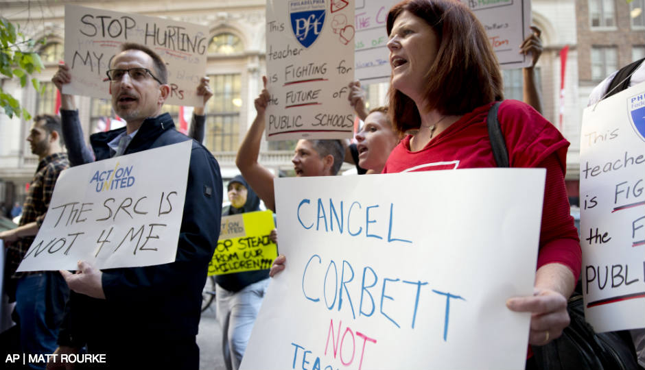 Protestors in October demonstrate against the school district's sudden decision to cancel teachers and others contract and force them to pay health care premiums. The Commonwealth Court just ruled the SRC lacks the power to void the teacher contract.
