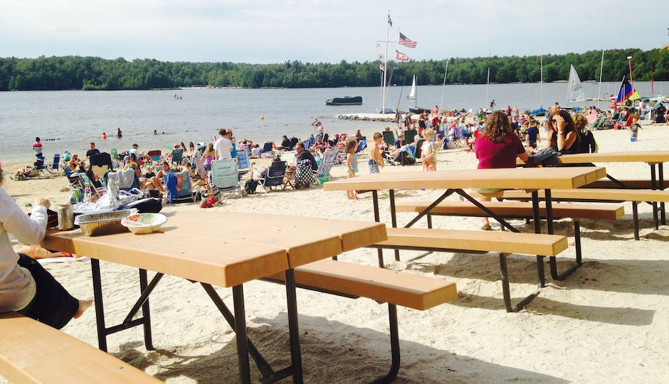 Summertime scene at one of Lake Naomi's beaches, a nice option for families with kids. 