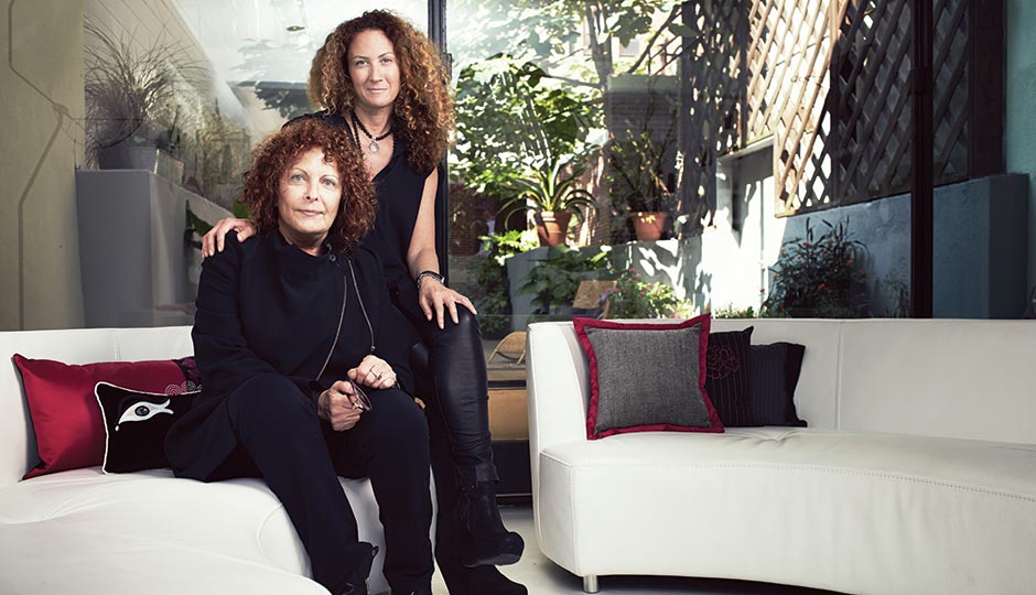 Joan Shepp and daughter Ellen in front of the outdoor garden in their new Chestnut Street digs. Photograph by Steven Laxton