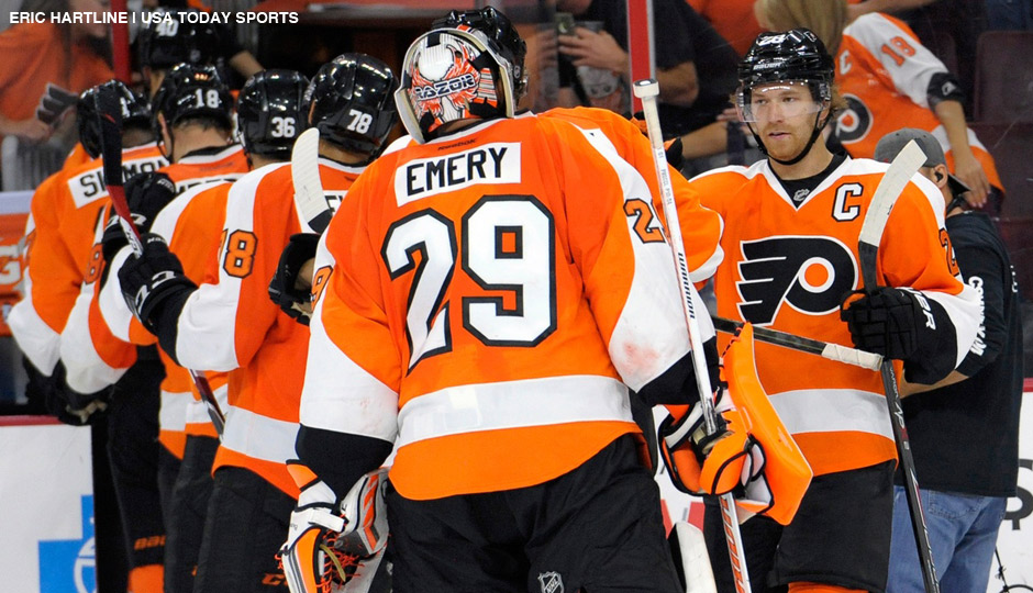 Sep 30, 2014: Philadelphia Flyers center Claude Giroux (28) celebrates with goalie Ray Emery (29) after defeating the New York Rangers, 4-2, at Wells Fargo Center.