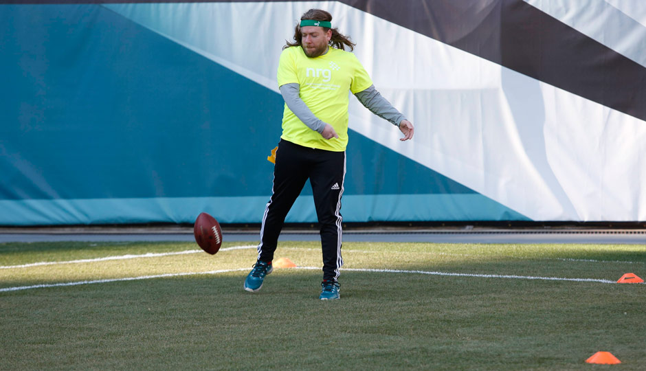 Dan McQuade spiking the ball, kind of