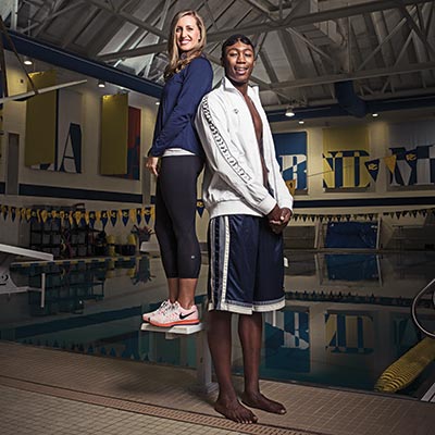 Whitley (with Coach Keelan) is fast enough to qualify for the 2016 Olympic trials. Photograph by Jared Castaldi