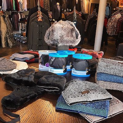Cozy winter head gear on display at Metro Men's Clothing. 