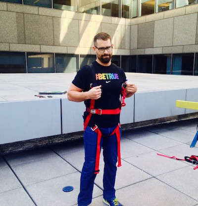 Sims in rappel gear this summer when he scaled TK.