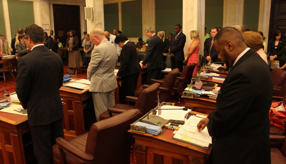 "And please, god, let me be re-elected.. Amen." Photo Credit: City Council Flickr page.