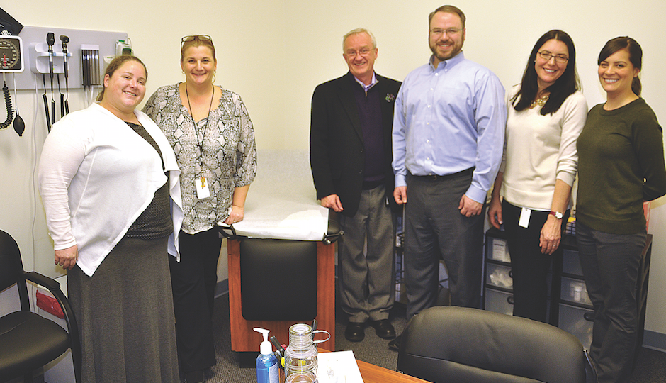 Burns and staff in the West Annex Clinic | Photo by Scott Drake / Philadelphia Gay News