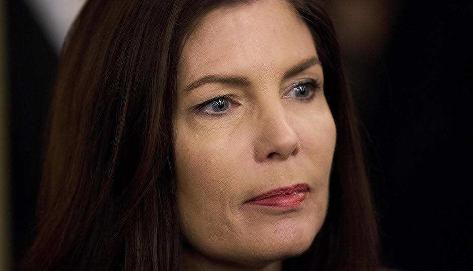 Pennsylvania Attorney General Kathleen Kane looks on before newly elected members of the Pennsylvania Legislature are sworn in, Tuesday, Jan. 6, 2015, at the state Capitol in Harrisburg, Pa. Republicans who control both the Senate and House picked up additional seats in the November election. In the House, Republicans outnumber Democrats 119 to 84 and in the Senate, 30 to 20. (AP Photo/Matt Rourke)