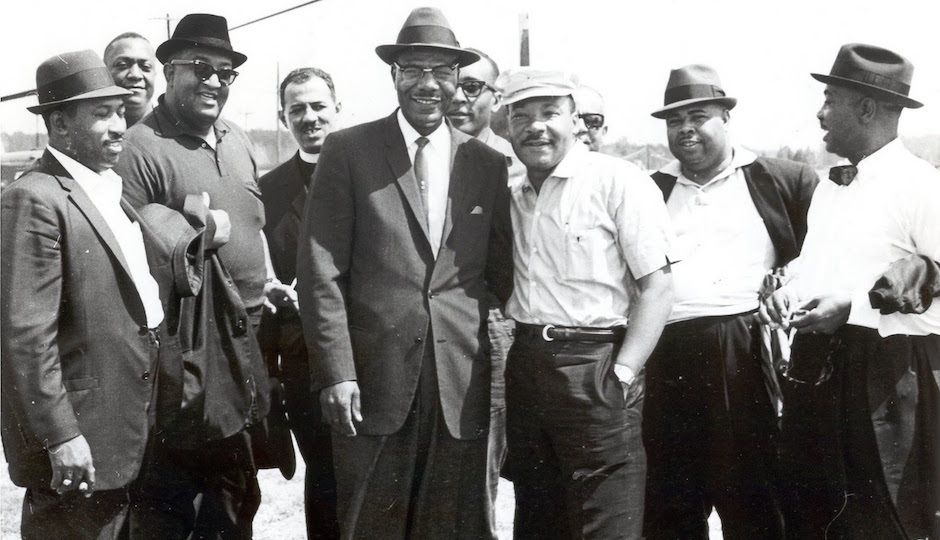 Dr. Martin Luther King Jr. poses with ministers from the Philadelphia delegation of the Selma to Motgomery Civil Rights March in 1965.