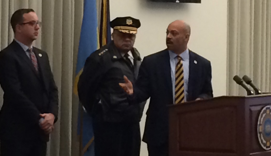 Commissioner Charles Ramsey, middle, looks on as D.A. Seth Williams announces charges against two Philadelphia Police officers.