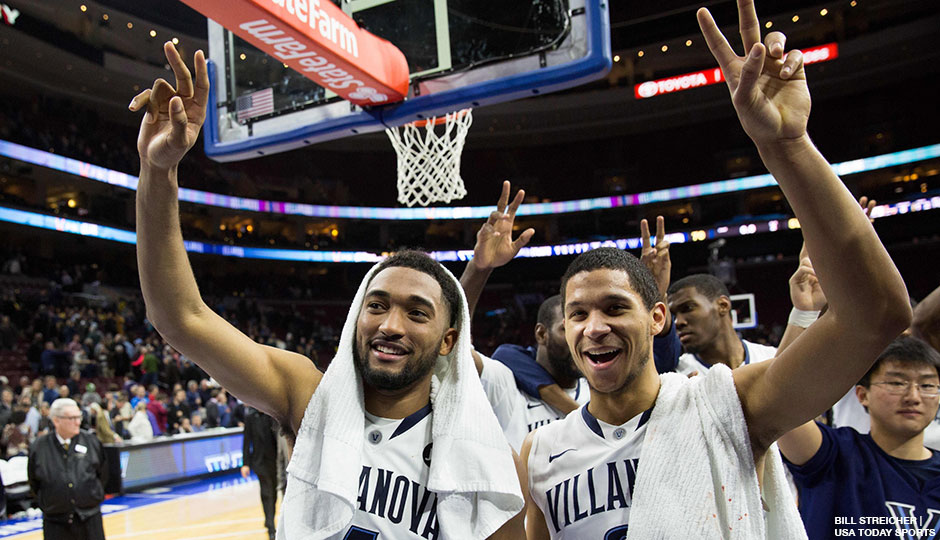 Villanova Wildcats guard Darrun Hilliard II (4) and guard Josh Hart (3) celebrate after defeating the Marquette Golden Eagles 70-52 during the second half at Wells Fargo Center.