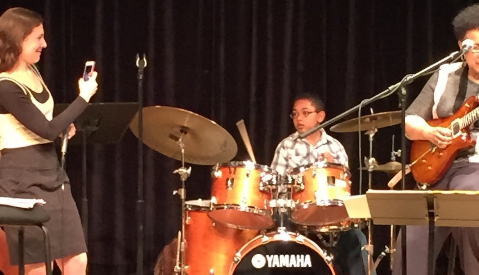 Jazz singer Venissa Santi taking a photo of the 8 year-old drummer during her Wednesday night set at the Kimmel's SEI Studio.