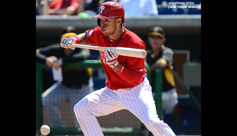 Philadelphia Phillies second baseman Cesar Hernandez (16) lays down a bunt in the first inning of the spring training game against the Pittsburgh Pirates at Bright House Field.
