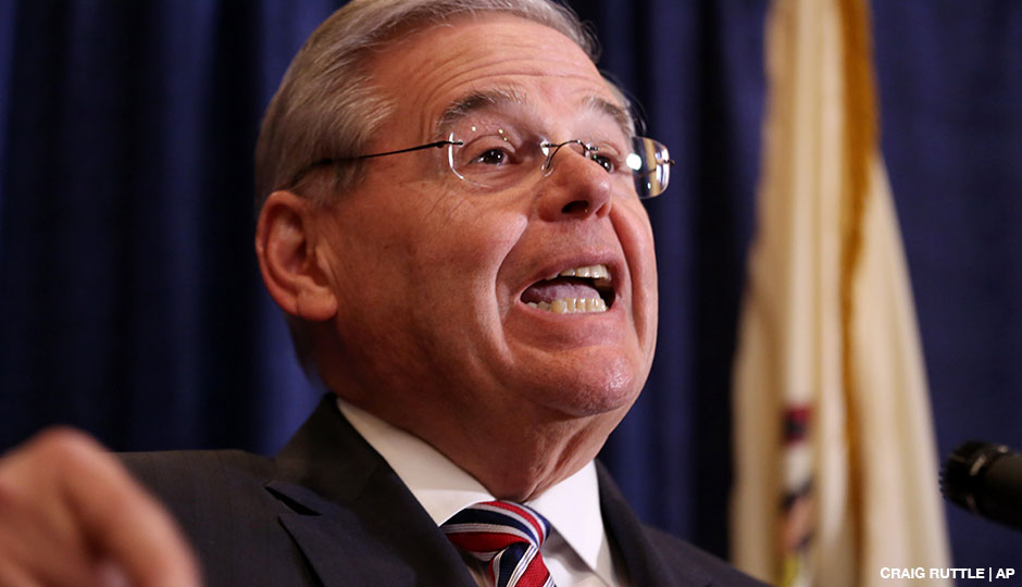 U.S. Sen. Bob Menendez speaks during a news conference, Wednesday, April 1, 2015, in Newark, N.J. Menendez, the top Democrat on the U.S. Senate Foreign Relations Committee, was indicted on corruption charges, accused of using his office to improperly benefit an eye doctor and political donor.