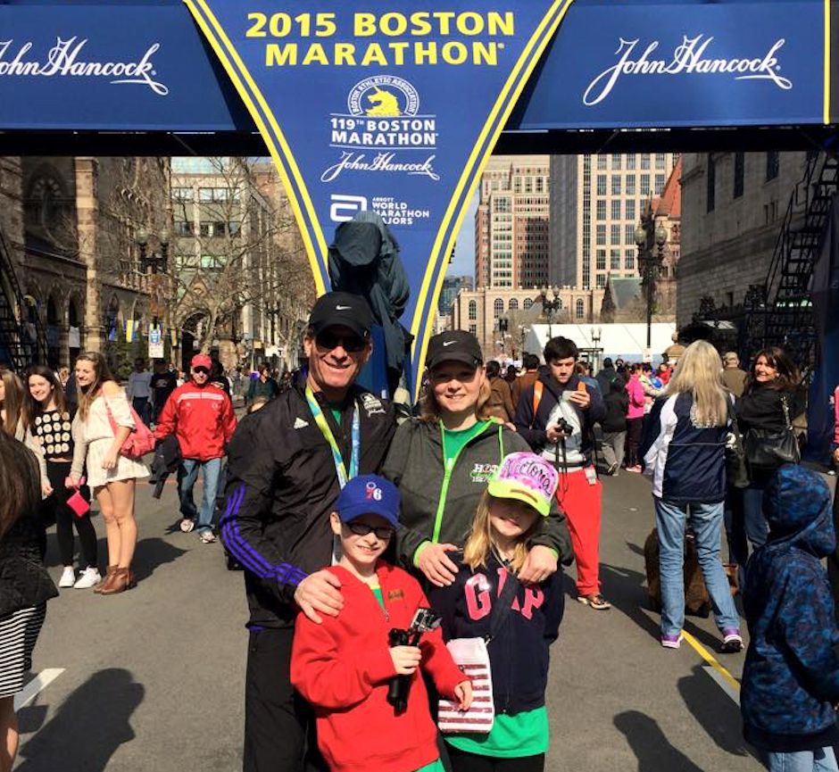 Mike Rossi and family at the Boston Marathon finish line.