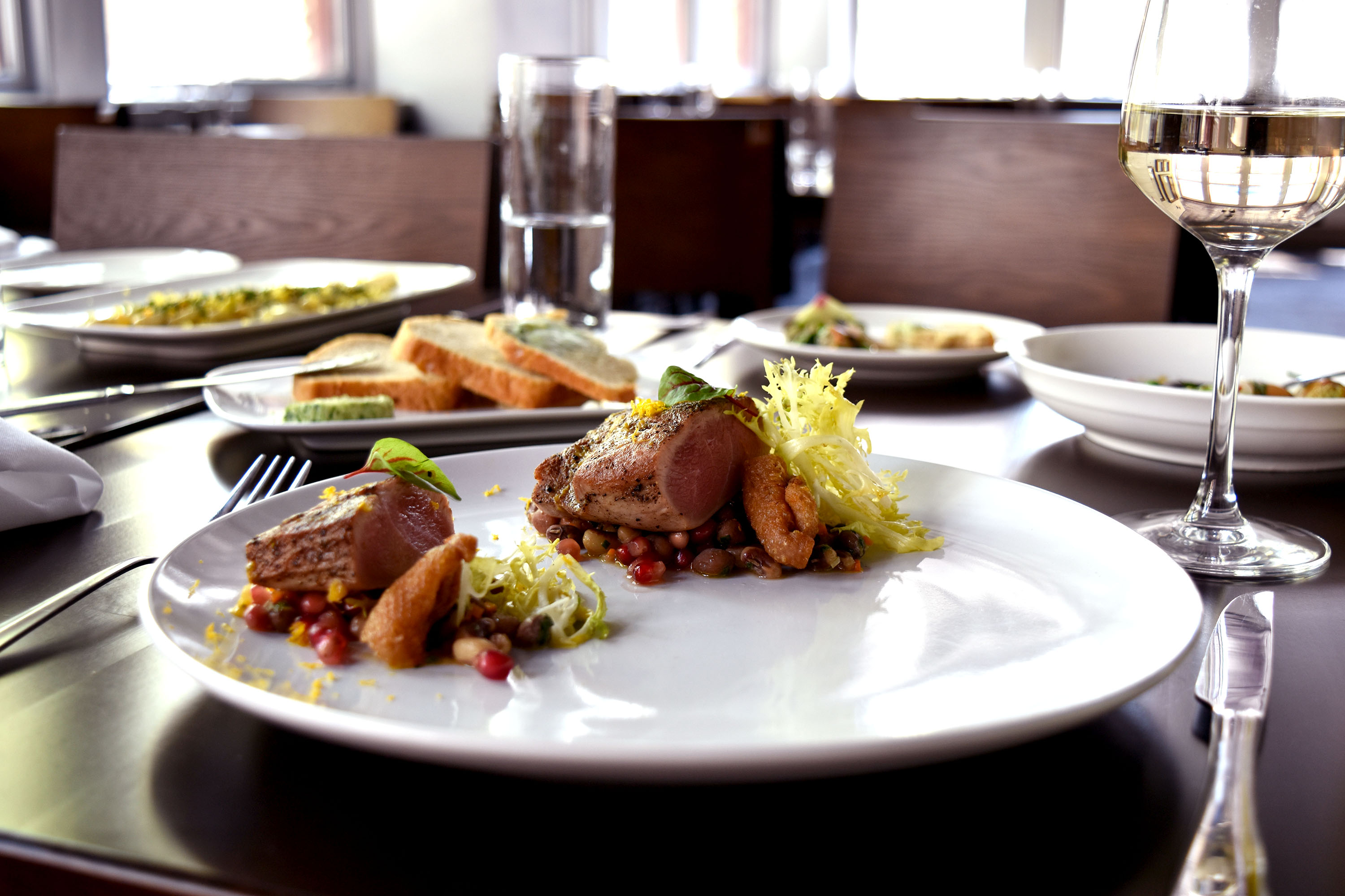 duck breast : heirloom beans : burnt orange vinaigrette : frisée