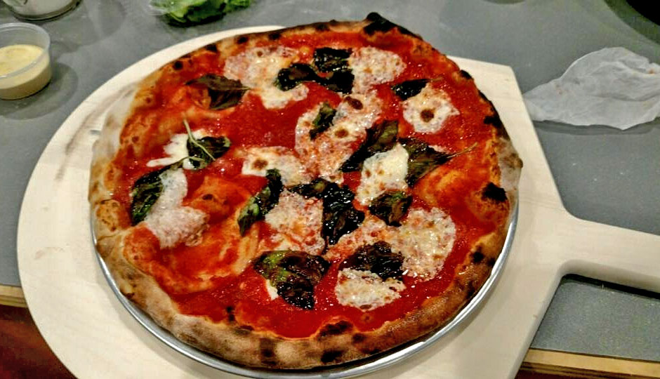 First Tacconelli's pizza out of the Navy Yard pizza oven.