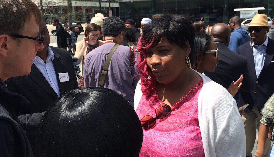 Tanya Brown-Dickerson greets supporters after a press conference at Dilworth Park. 