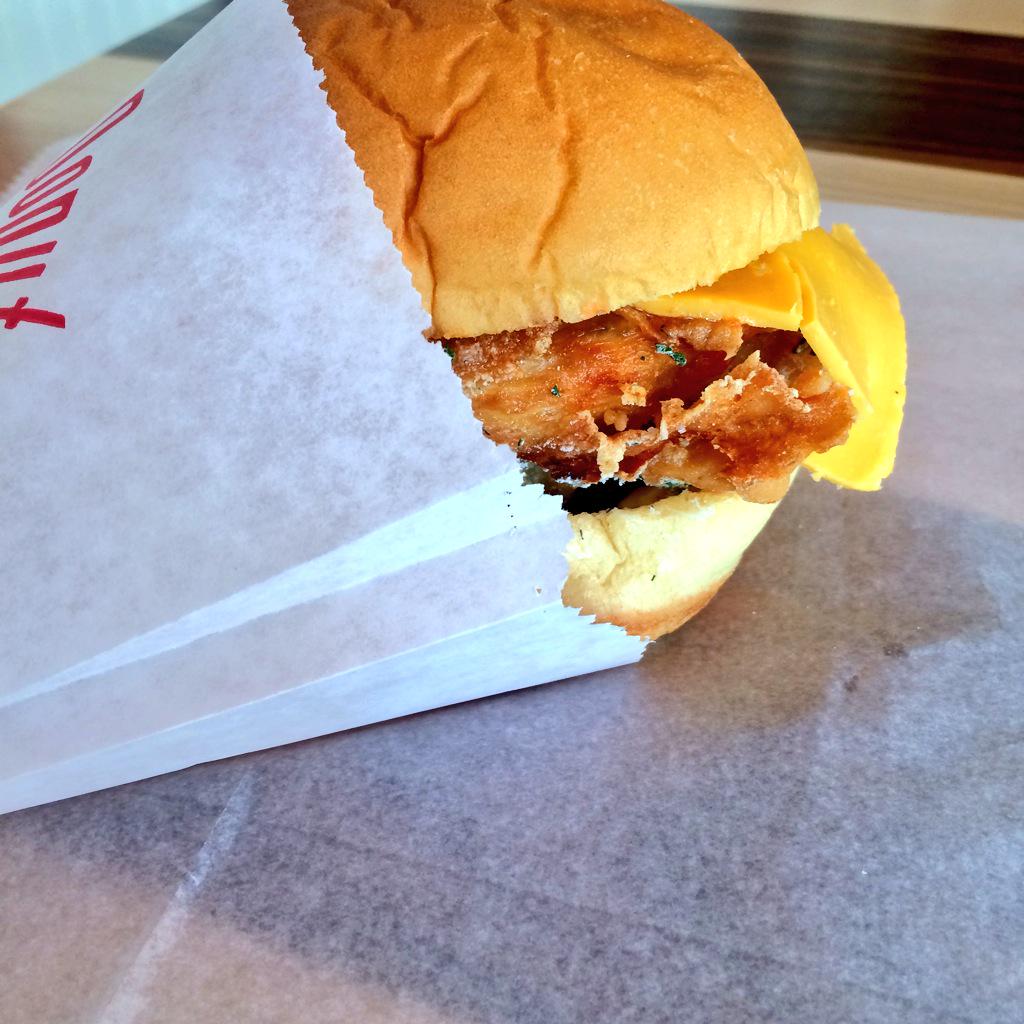 Fried chicken sandwich with buttermilk ranch, American cheese, Red Hot mayo on a potato roll.