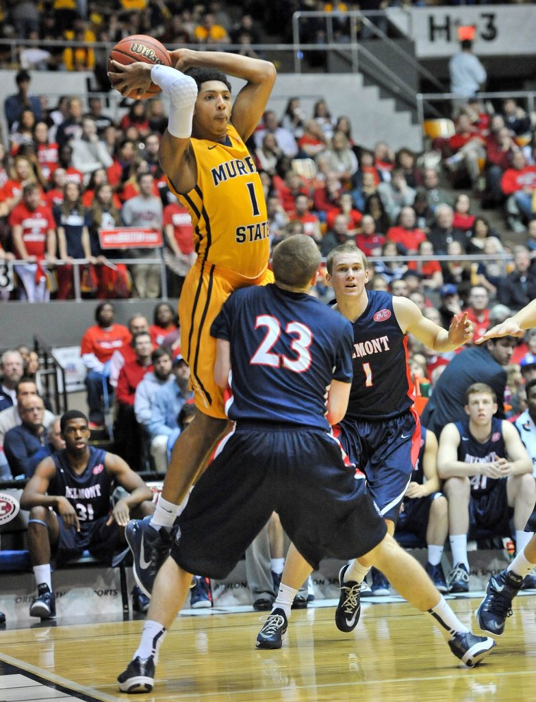 Mar 7, 2015; Nashville, TN, USA; Murray State Racers guard Cameron Payne (1) passes against Belmont Bruins guard Craig Bradshaw (23) during the first half at Nashville Municipal Auditorium. Mandatory Credit: Jim Brown-USA TODAY Sports