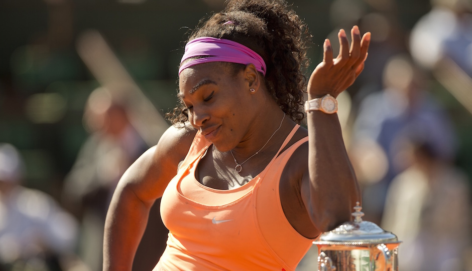 Serena Williams (USA) poses with the trophy after her match against Lucie Safarova (CZE) on day 14 of the 2015 French Open at Roland Garros. | Susan Mullane-USA TODAY Sports