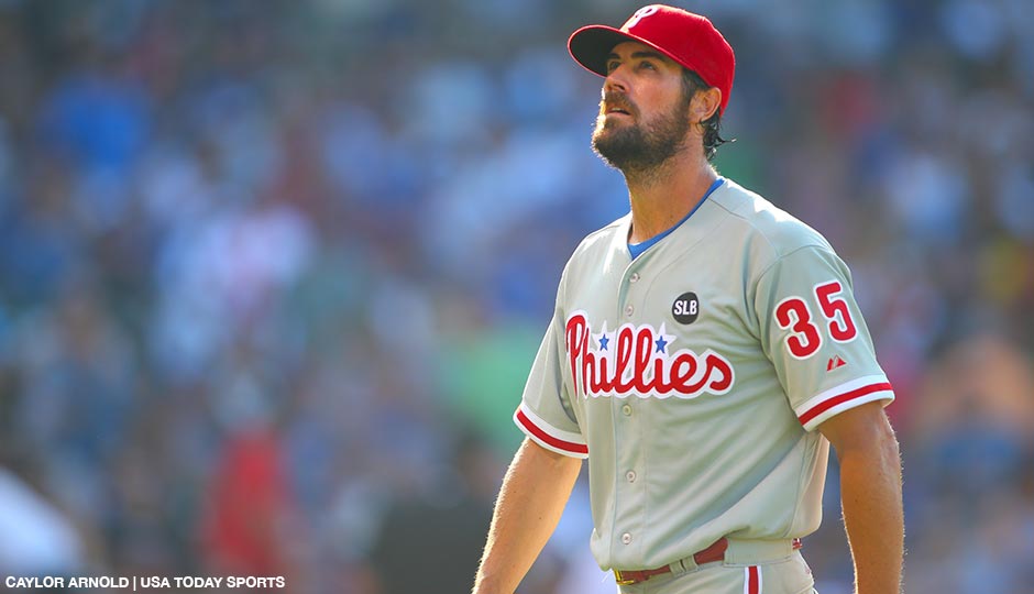 Cole Hamels walks off the field after the eighth inning against the Chicago Cubs at Wrigley Field, July 25, 2015.