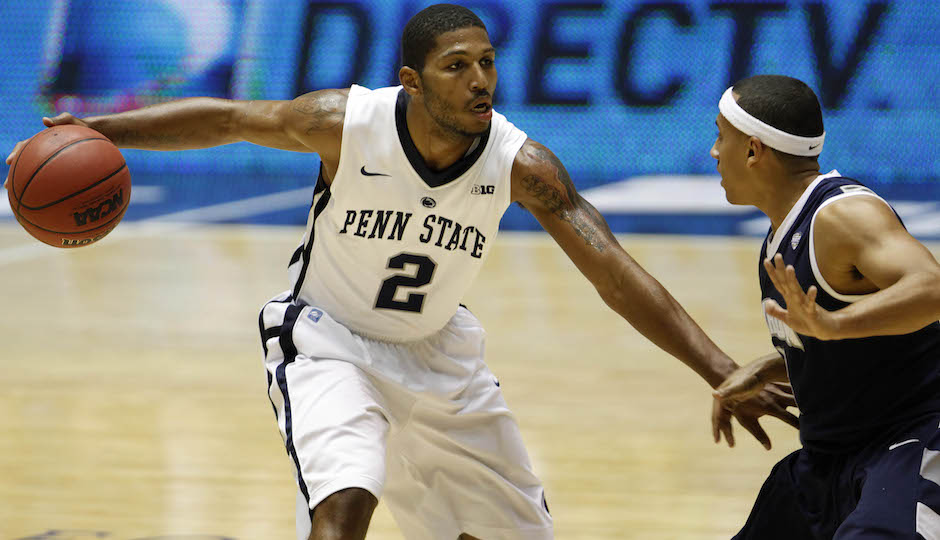 Penn State’s DJ Newbill, left, drives against Akron’s Alex Abreu during a NCAA college basketball game in Bayamon, Puerto Rico, Sunday, Nov. 18, 2012. (AP Photo/Ricardo Arduengo)