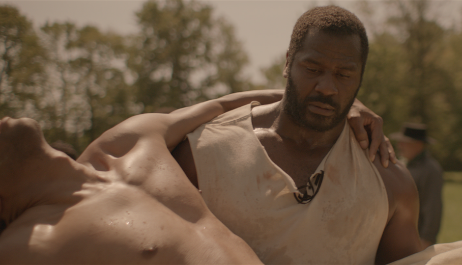 Benjamin Jones (Jeremiah Trotter) carries Lewis (John Wooten) in The North Star. 