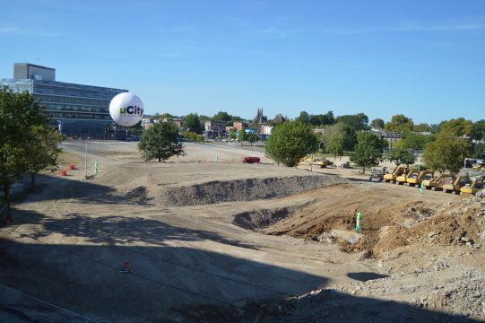 The future site of the public square is roughly marked by the green balloons.