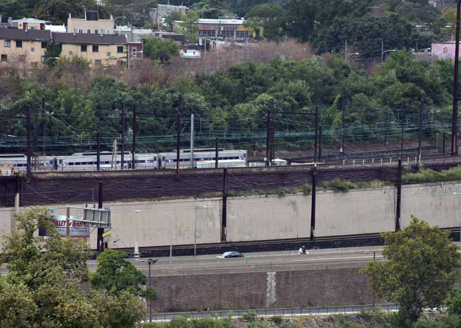 VIP gets a police escort on MLK Drive as SEPTA train heads towards West