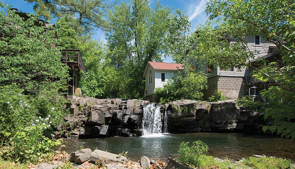 A waterfall near Woodstock’s main street. Photograph by Cindy Halliburton