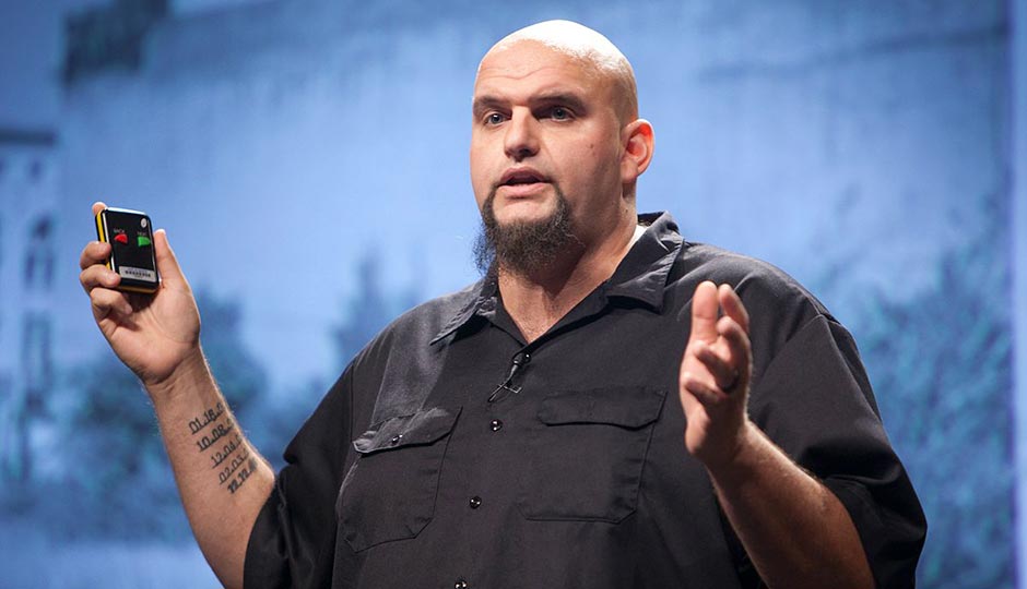 "John Fetterman - Pop!Tech 2009 - Camden, ME 2" by PopTech from Camden, Maine and Brooklyn, NY - John Fetterman - Pop!Tech 2009 - Camden, ME. Licensed under CC BY-SA 2.0 via Commons.