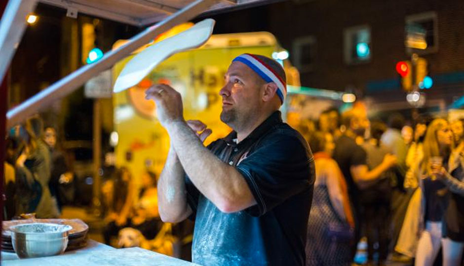 Night Market Pizza Throwing | Photo by Dave Tavani for The Food Trust
