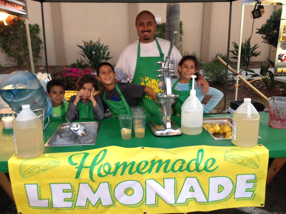 Aaron Miranda and four of his five kids at their lemonade stand in California.