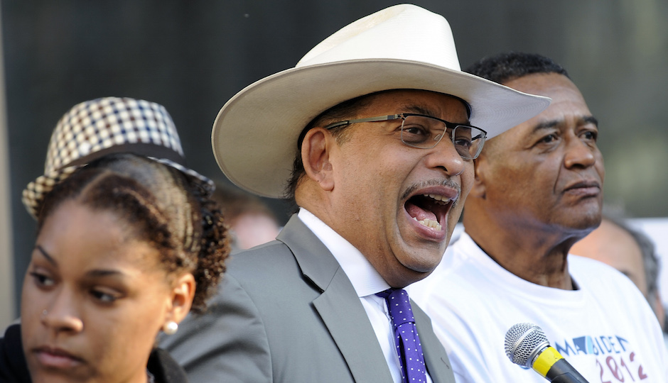 President of the NAACP's state conference, J. Wyatt Mondesire, middle, speaks to people gathered to demonstrate the opposition of Pennsylvania's new voter identification law during the NAACP voter ID rally, Thursday, Sept. 13, 2012, in Philadelphia. Pennsylvania's Supreme Court justices are scheduled to hear arguments over whether a new law requiring each voter to show valid photo identification poses an unnecessary threat to the right to vote. (AP Photo/Michael Perez)